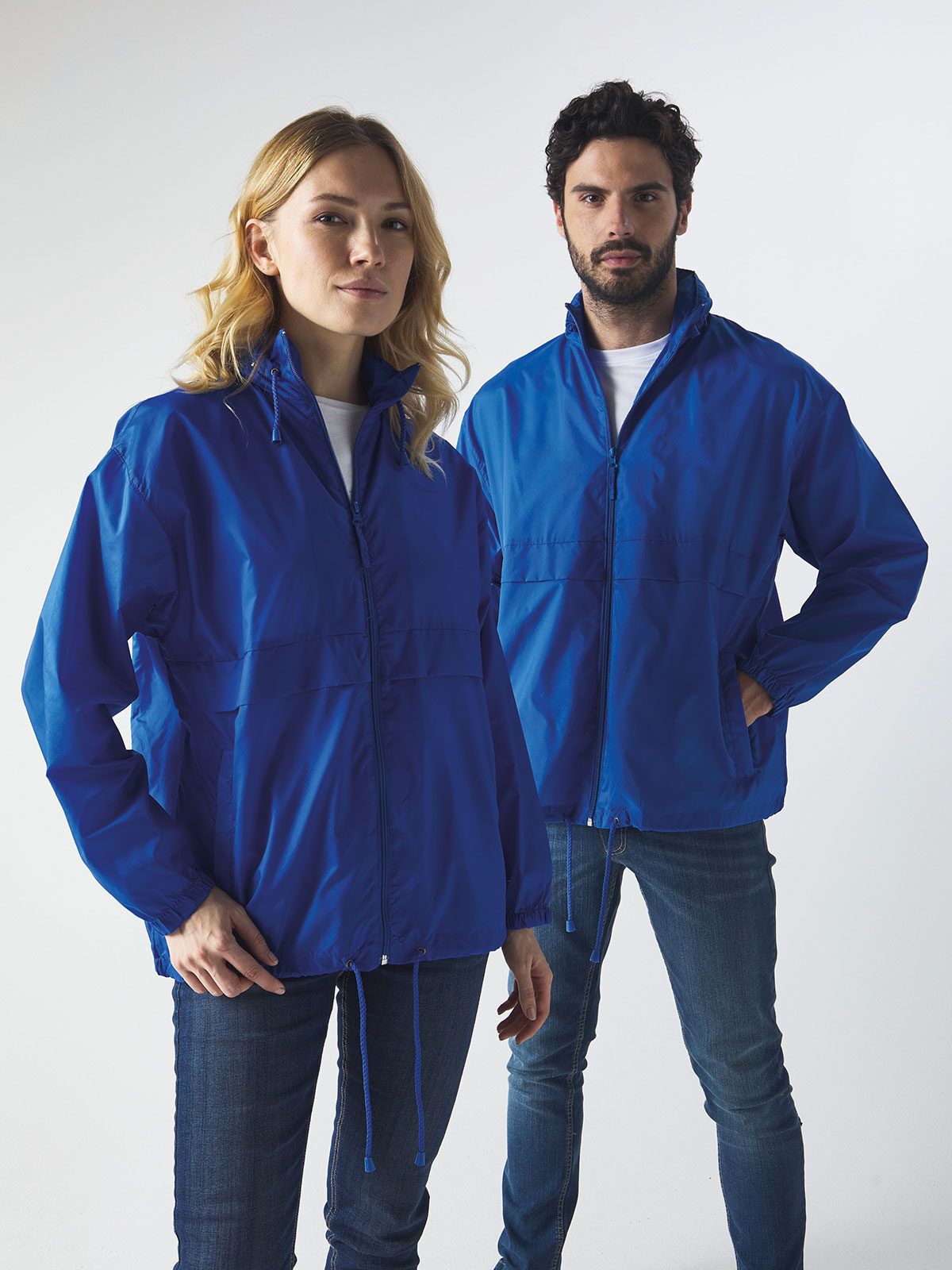 Giacca antivento unisex con cappuccio richiudibile nella tasca - Sprintex - SP500